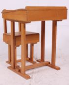A 1950's childs school desk and chair by Taylor of Leicester.