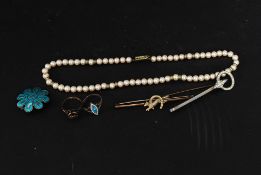 A silver and enamel ring and brooch in the manner of Charles Horner togehter with a rolled gold