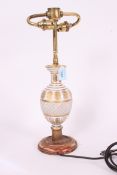A 19th century Bohemian glass and brass table lamp.