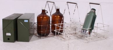 Three vintage chemical carry racks one with two original smoked glass chemical bottles ( no