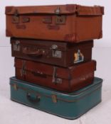 A stack of 4 vintage suitcases / trunk to include leather etc ( see illustrations ).