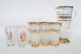 A 1960's Lemonade set with gold banded drinking glasses and matching jug,