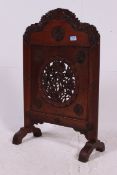 A early twentieth century Chinese pierced and carved Padouk (Indonesian hard) wood screen
