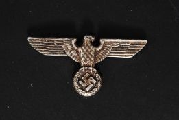 Nazi eagle silver plated cap / uniform badge depicting the eagle stood atop a Swastika emblem.