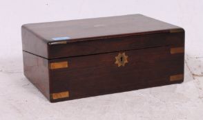 A Georgian 19th century rosewood writing slope having a lined interior with slope having exterior