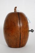 An antique style fruitwood tea caddy in the form of a melon, with key.