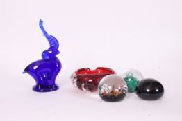 A collection of studio glass to include Bristol Blue elephant,