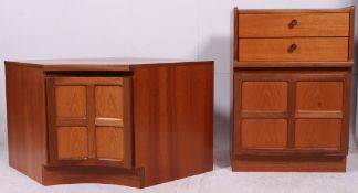 A retro Nathan teak wood corner cabinet having fielded panel twin doors with recessed plinth