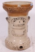 An original 19th century Prices Of Bristol stoneware water filter. Notation to front.