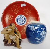 A mixed lot of Chinese oriental blue and white ginger jar together with a figurine and a  pipe
