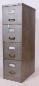 A mid 20th century Industrial office upright pedestal 4 drawer filing cabinet having hoop handles
