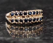 A 9ct gold ladies twin channel set hallmarked ring.