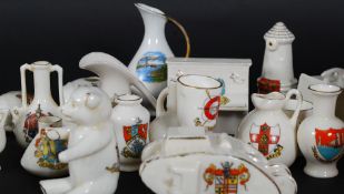 A good collection of crested china to include several unusual shapes, post box, teddy bear, piano,