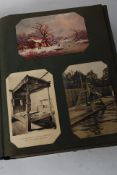 An Edwardian postcard album featuring a range of postcards, mostly topographical.