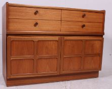 A good quality retro Nathan teak wood sideboard / dresser having twin drawers over double door qtr