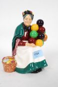 A good Royal Doulton figurine entitled ' Balloon Lady ' model no  HN 2935 bearing early stamps to