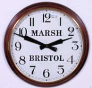 A good large Station clock having a mahogany and brass surround to the oversized face with notation