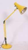 A later painted yellow retro anglepoise Herbert Terry standard lamp having pendant shade with