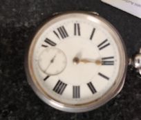 A silver hallmarked pocket watch having enamel face with subsiduary seconds dial by M Cohen & Co of