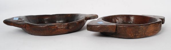 2 wooden African tribal bowls - dough buns being hand carved from hardwood