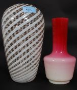 An Italian art glass studio vase having swirl design to the bulbous body together with a pink two