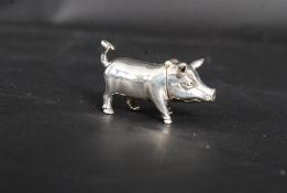 A 20th century antique style white metal (stamped 925 indicating silver content) vesta in the form