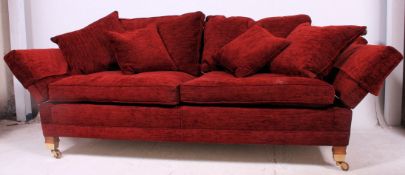 A good Twentieth century Duresta ' Trafalgar ' pattern knoll style sofa raised on mahogany tapered