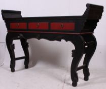 A 20th century Chinese Altar table sideboard in black and red having shaped top with fitted drawers
