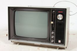 A retro - 1970's Murphy portable television complete with the original packaging.