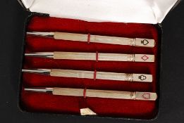 A white metal silver (stamped Sterling ) deck of card themed miniature propelling pencils.