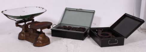 A large pair of mid 20th century Avery Scales complete with 2 deed boxes full of weights.