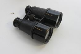 A pair of War Office Model Binoculars in the original leather case stamped War office model by