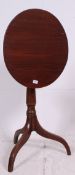 A good 19th century mahogany tripod tilt top wine table / occasional table. Raised on a tripod