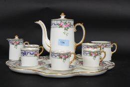An Aynsley coffee set, with coffee pot, cream jug, sugar bowl, five coffee cans and saucers,