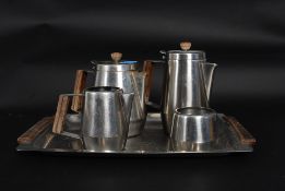 A 20th century retro stainless steel coffee set consisting of pot, water pot,creamer,