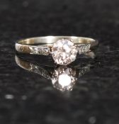 An 18ct white gold single stone diamond ring, 60pt. Weight: 1.8g size O.