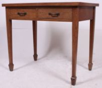 An excellent early 20th century Air Ministry oak single writing table desk being raised on squared