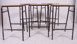 A set of Five stacking Vintage Laboratory / School stools- Brown metal frames with wooden seats