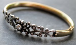 An 18ct gold and diamond bracelet.