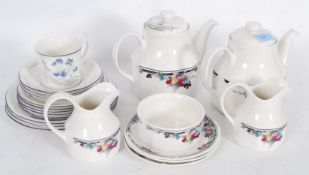 A Royal Doulton Autumn Glory part tea service comprising teapot, cups,