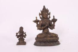 A Himalayan bronze figure of Tara together with a bronze figure of Ganesha