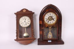 A 19th century American Gingerbread wall clock along with another wall clock please see images