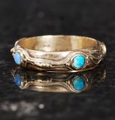 A 9ct gold art nouveau style opal ring. Weight: 3.