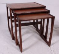 A 1970's retro G-Plan teak wood nest of tables in the Kelso pattern.