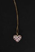 A 9ct gold chain with a 9ct ruby and diamond pendant. Weight: 4g.