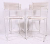 A set of 4 Giandomenico Belotti for Alias contemporary Spaghetti dining chairs in white with