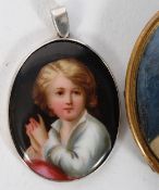 Two Portrait pendants one being on enamel the other  being a glazed water colour mounted on gold