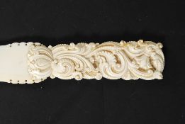 A fine example of a 19th century carved ivory page turner,