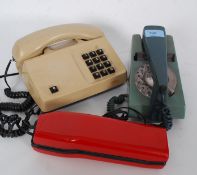 A collection of 3 vintage telephones to include a trim line BT ring dial,
