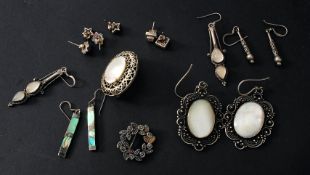 A collection of ladies silver earrings to include mother of pearl ingot shaped, tear drop stone set,